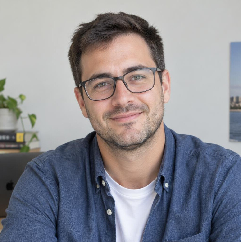 Portrait of a young man with glasses smiling