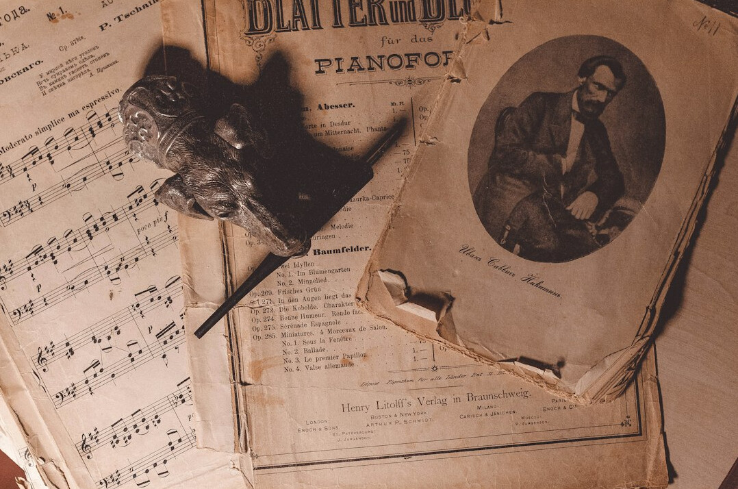 musician with old notebook