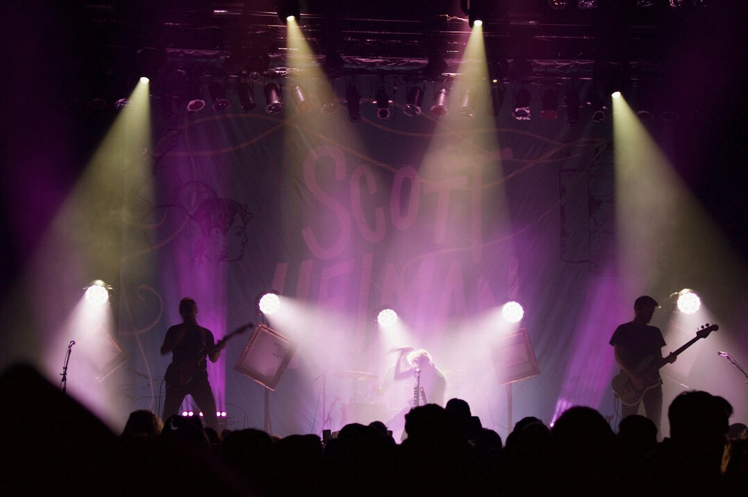 Live music concert with stage lights and audience